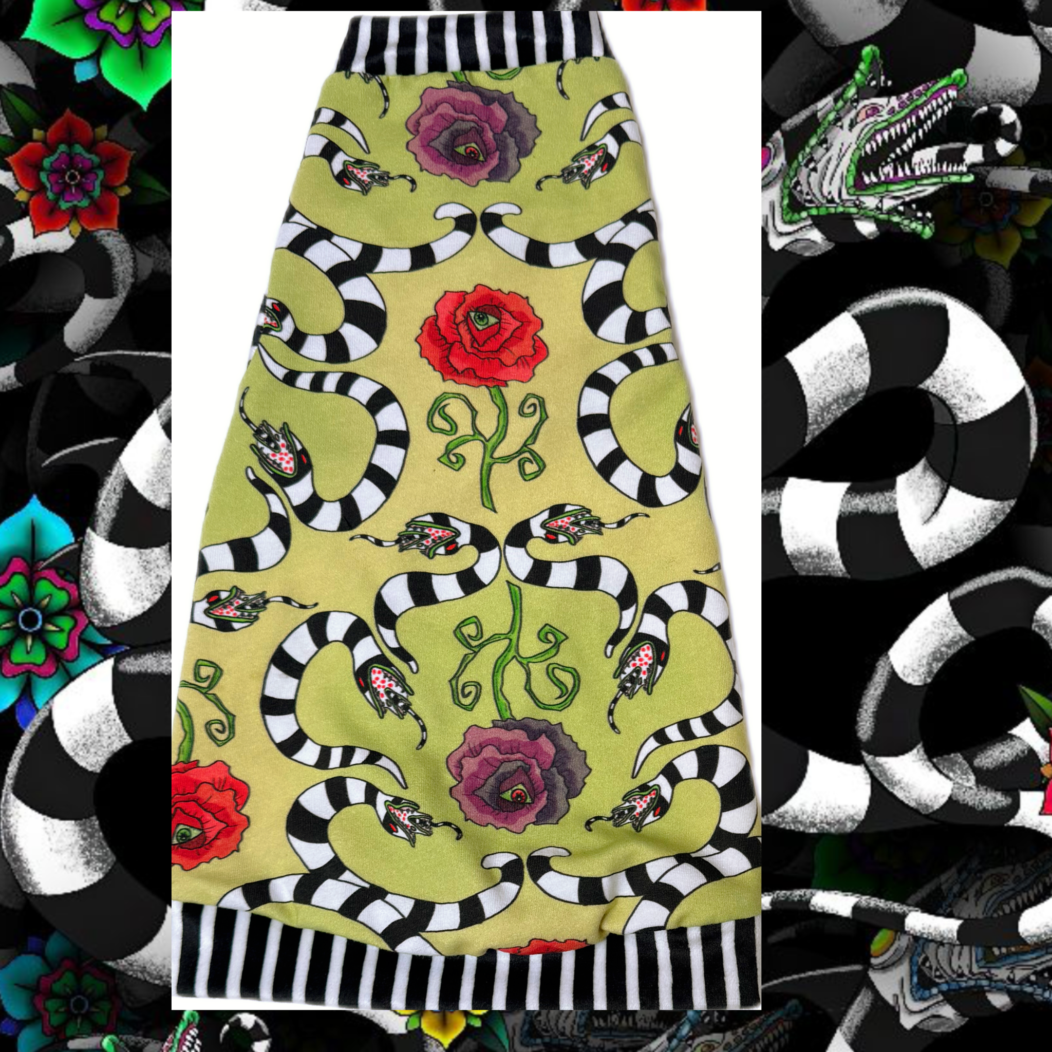 Sphynx cat shirt with playful black and white striped sandworms and eyeball flowers on an olive green cotton blend fabric with soft plush striped trim