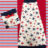 Adorable red, white, and blue skull shirt with red bow tie!  This is a beautiful, medium-light weight cotton blend!  Cute, comfortable, and nice stretch!