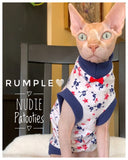 Adorable red, white, and blue skull shirt with red bow tie!  This is a beautiful, medium-light weight cotton blend!  Cute, comfortable, and nice stretch!